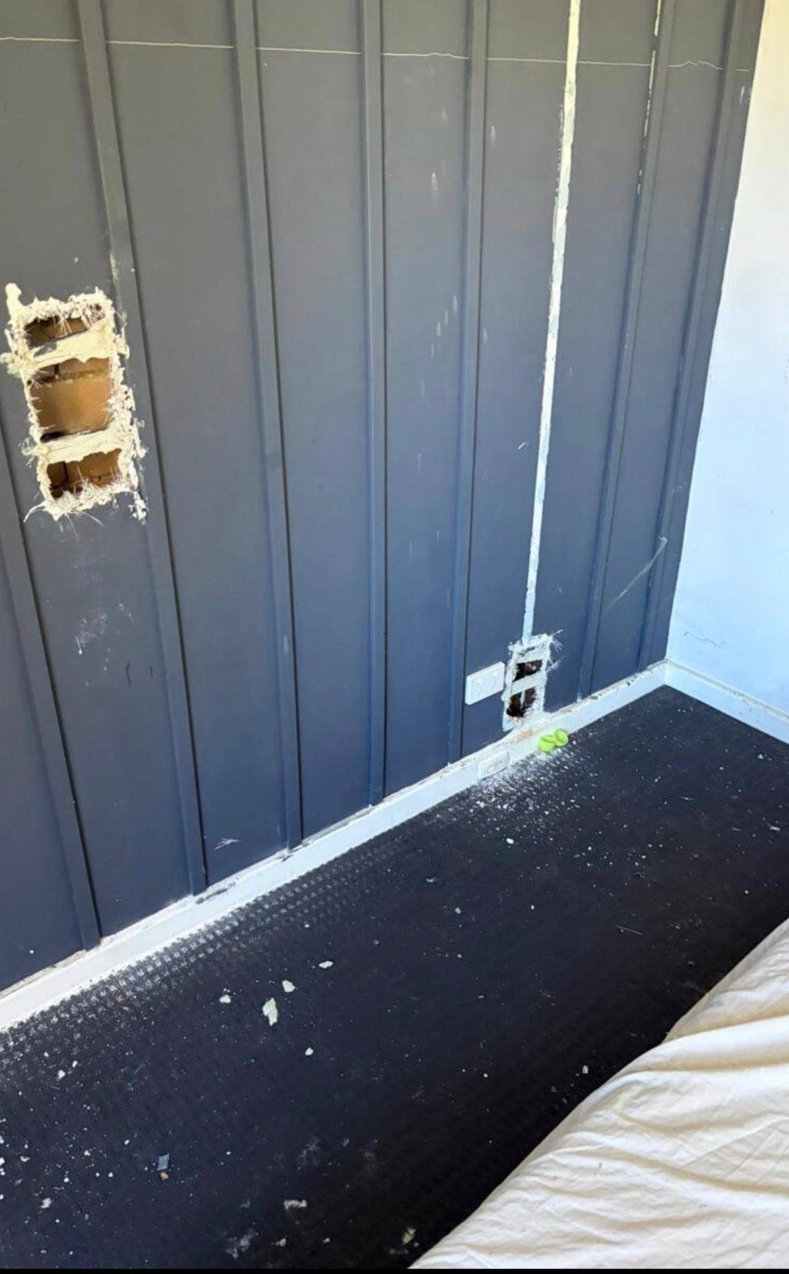 Damaged feature wall before painting